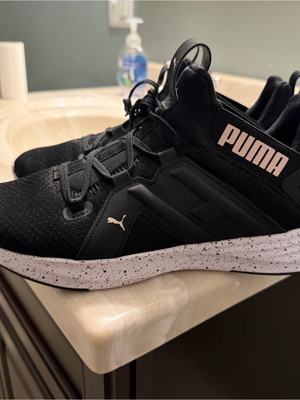 Puma Women’s Black Sneakers with White Speckled Midsoles